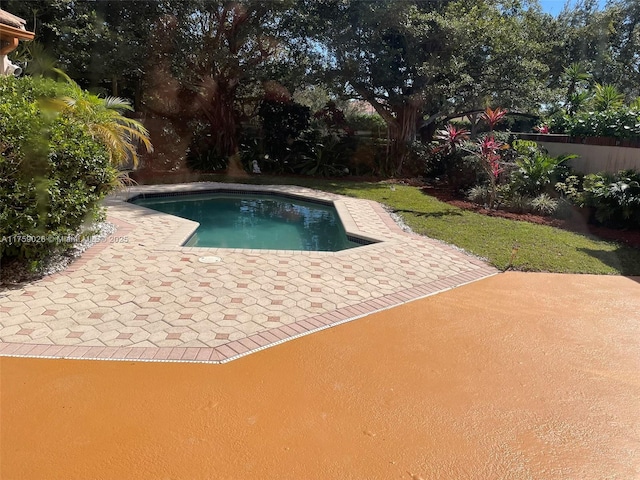 view of pool featuring a fenced in pool and a patio area