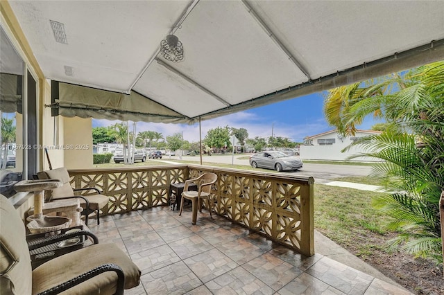 view of patio featuring a porch