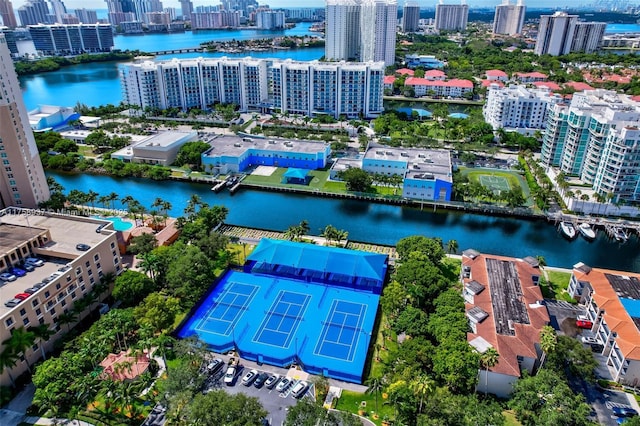 bird's eye view featuring a water view and a view of city