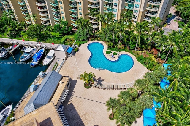 view of pool featuring a water view