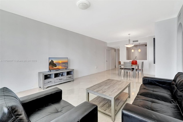 3340 NE 190th St Unit 1608, Aventura, FL 33180 - living room featuring visible vents, baseboards, and light tile patterned flooring