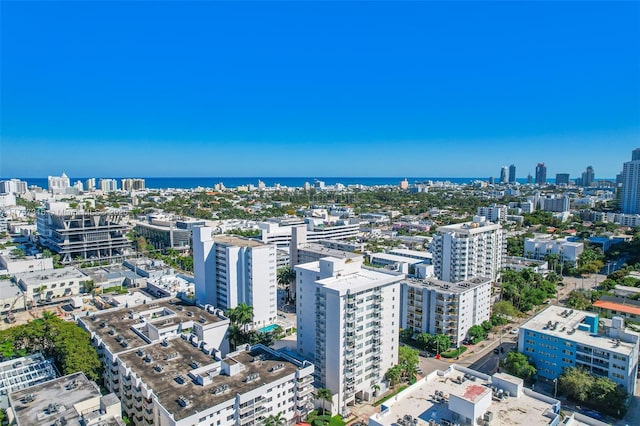 bird's eye view with a view of city and a water view