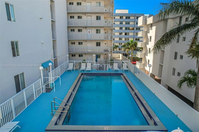 pool featuring fence