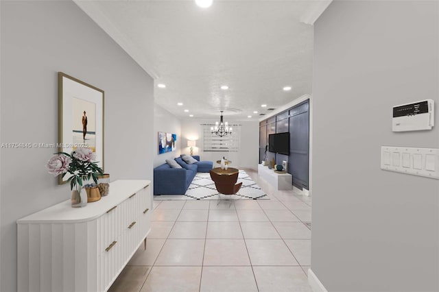 living area featuring recessed lighting, a notable chandelier, baseboards, and light tile patterned floors