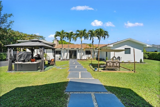 surrounding community featuring a gazebo, a yard, and outdoor lounge area