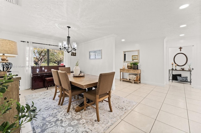 dining area with visible vents, crown molding, a textured ceiling, and light tile patterned floors