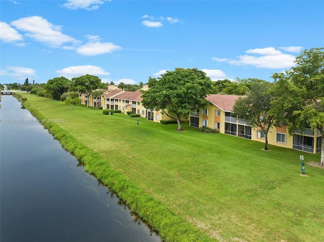 exterior space with a water view