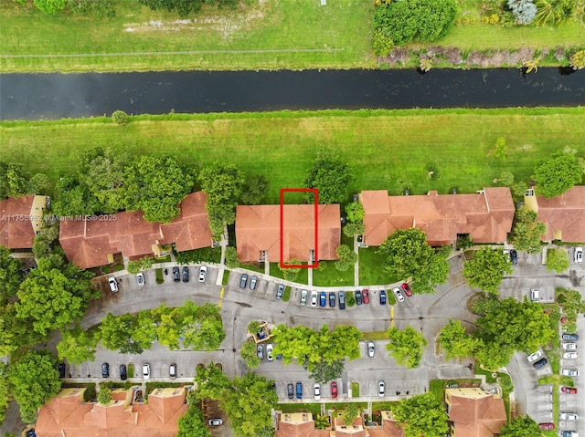 drone / aerial view featuring a water view