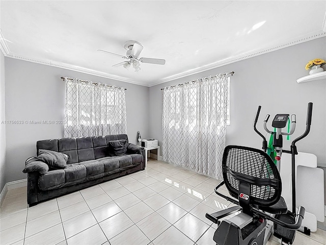 living room featuring light tile patterned floors, ornamental molding, a ceiling fan, and baseboards