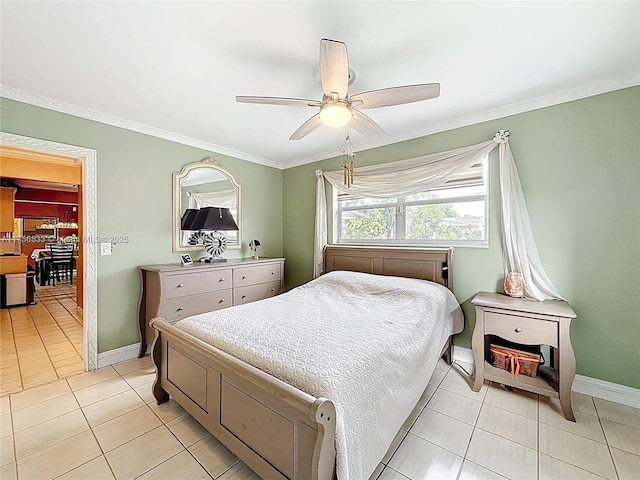 bedroom featuring baseboards, ceiling fan, light tile patterned flooring, and crown molding