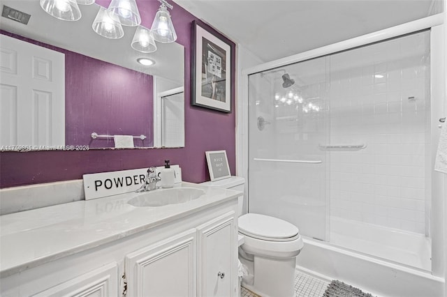 full bathroom featuring toilet, tile patterned flooring, an enclosed shower, and vanity