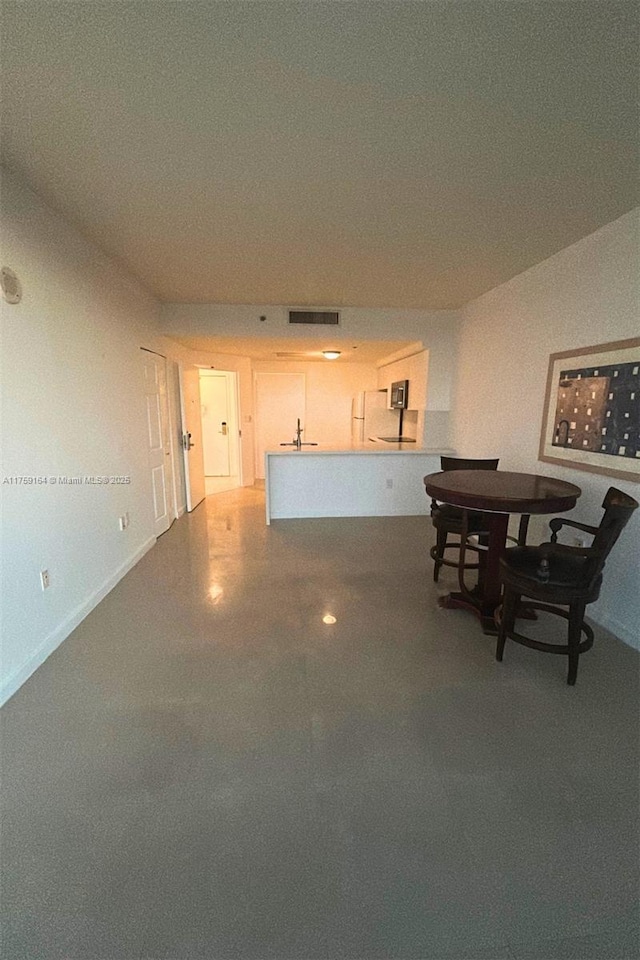 2889 Mcfarlane Rd Unit 1511, Miami, FL 33133 - living area featuring visible vents and baseboards