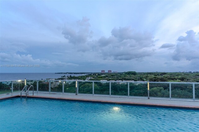 2889 Mcfarlane Rd Unit 1511, Miami, FL 33133 - view of swimming pool with a water view