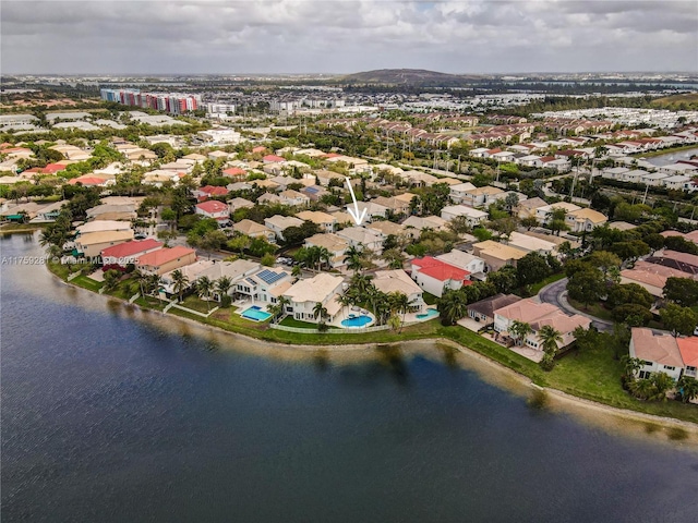 aerial view featuring a water view and a residential view