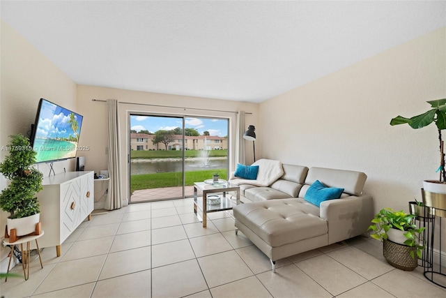 living area featuring light tile patterned flooring