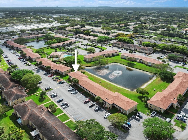 aerial view featuring a water view and a residential view