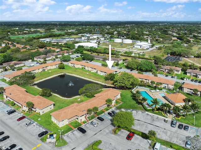 aerial view with a water view and a residential view