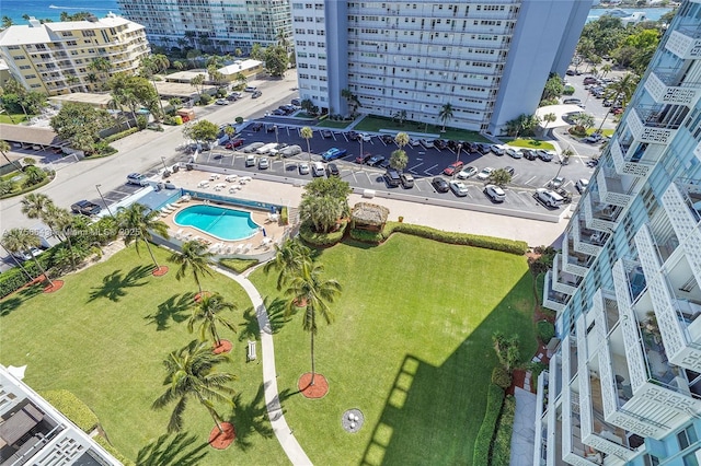 birds eye view of property with a city view