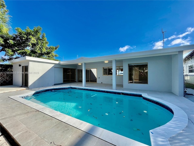 outdoor pool with a patio