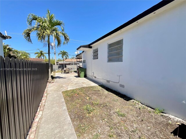 31 W 64th St, Hialeah, FL 33012 - view of yard with a patio and fence