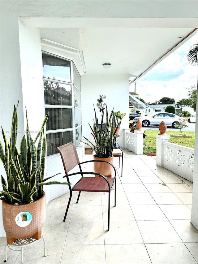 balcony featuring a porch