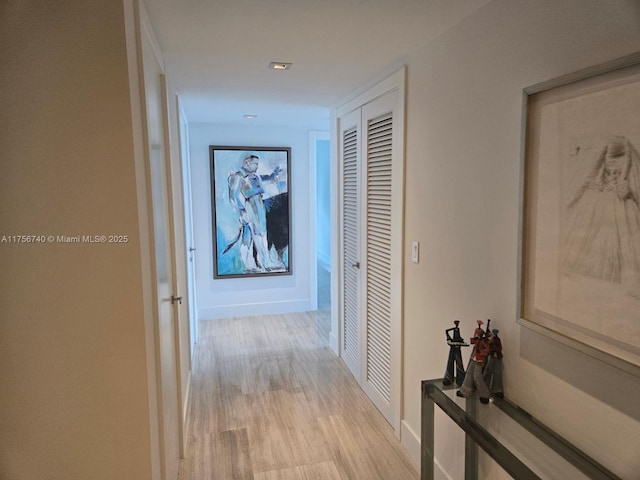1451 Brickell Ave Unit 1201, Miami, FL 33131 - hall with light wood-type flooring and baseboards