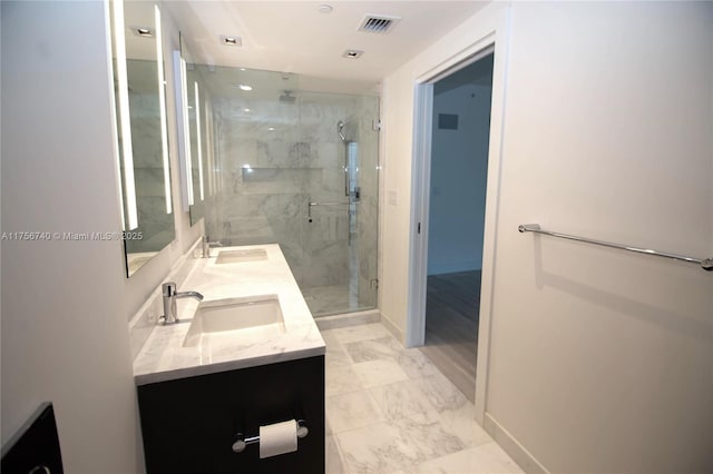 1451 Brickell Ave Unit 1201, Miami, FL 33131 - bathroom featuring double vanity, a marble finish shower, and marble finish floors