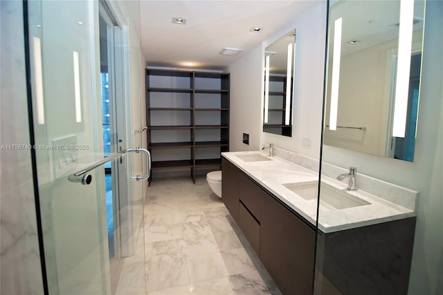 1451 Brickell Ave Unit 1201, Miami, FL 33131 - bathroom with marble finish floors, double vanity, and a shower stall