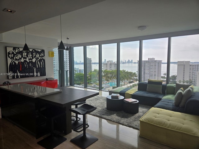 1451 Brickell Ave Unit 1201, Miami, FL 33131 - living room featuring a view of city, wood finished floors, and expansive windows