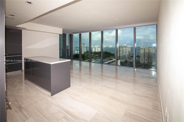 1451 Brickell Ave Unit 1201, Miami, FL 33131 - spare room featuring floor to ceiling windows and a city view