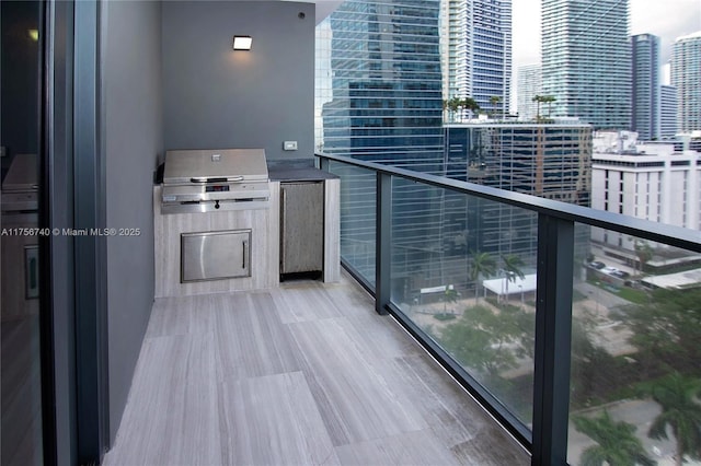 1451 Brickell Ave Unit 1201, Miami, FL 33131 - balcony with a city view and an outdoor kitchen
