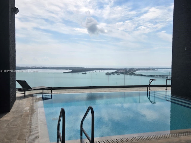 1451 Brickell Ave Unit 1201, Miami, FL 33131 - community pool featuring a water view