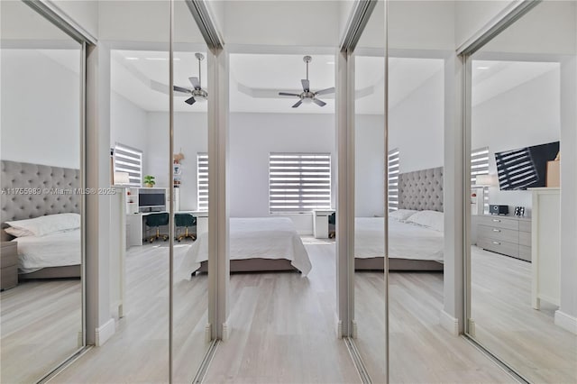 bedroom with ceiling fan and wood finished floors