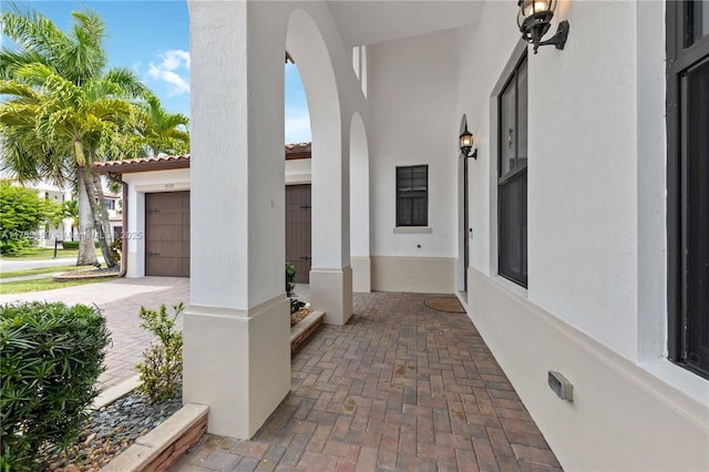 view of patio featuring an attached garage