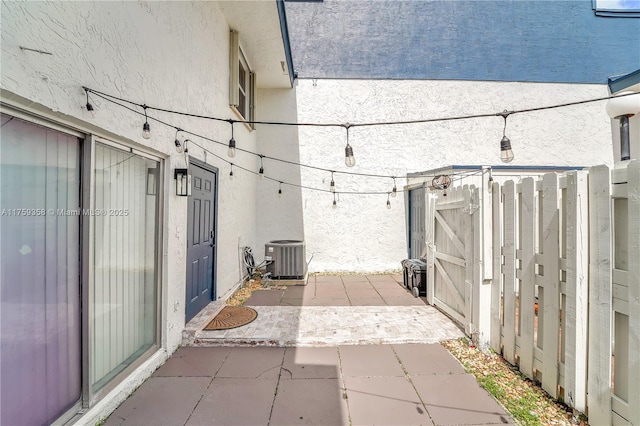 view of patio featuring central air condition unit