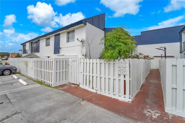 exterior space with a fenced front yard