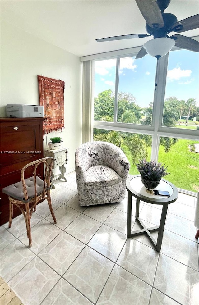 interior space featuring a ceiling fan