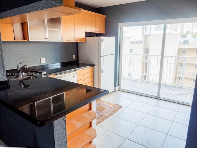 kitchen with light tile patterned floors, white appliances, a healthy amount of sunlight, and open shelves