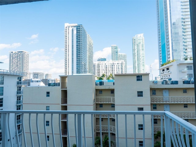 balcony featuring a city view