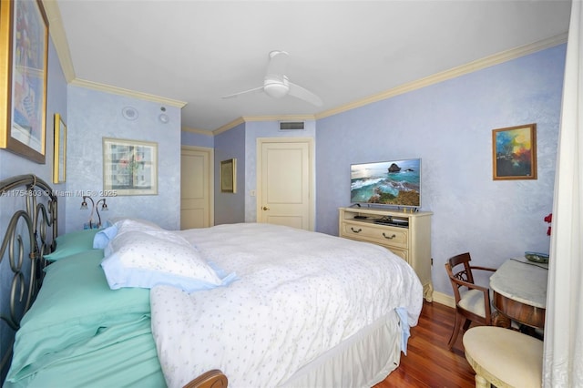 bedroom with visible vents, baseboards, a ceiling fan, dark wood-style flooring, and crown molding