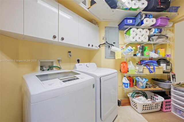 laundry area featuring independent washer and dryer and cabinet space