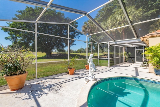 pool with a yard, a lanai, and a patio