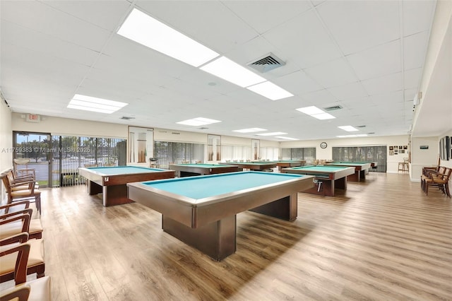 playroom featuring light wood-type flooring, visible vents, billiards, and a paneled ceiling