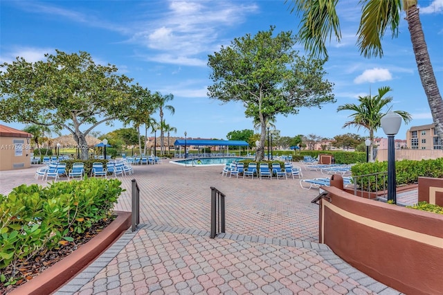 view of community with a patio area and a pool