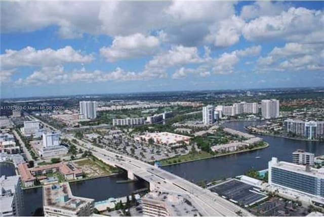 drone / aerial view with a view of city and a water view