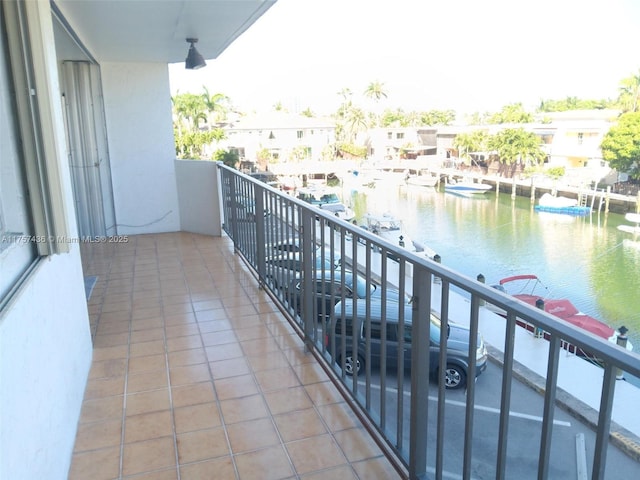 balcony featuring a water view