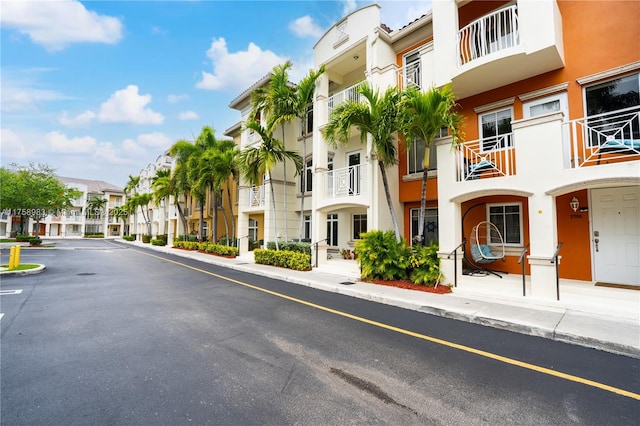 view of building exterior with a residential view