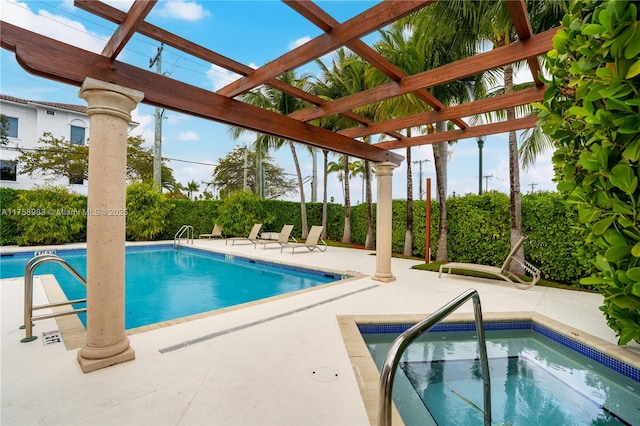 pool featuring a community hot tub, a pergola, and a patio