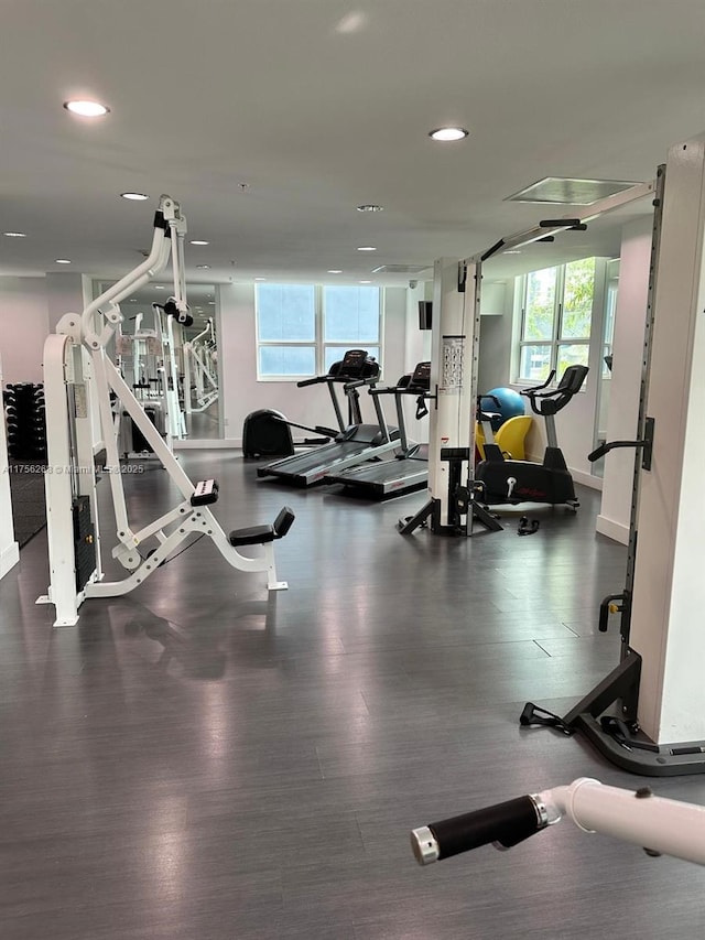 gym featuring recessed lighting and wood finished floors