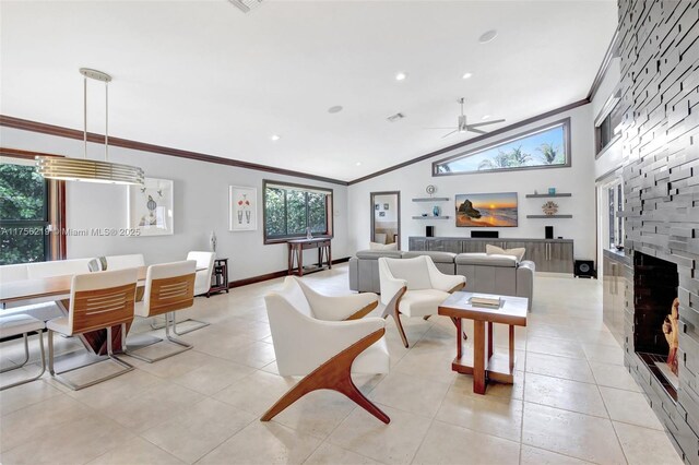 12200 SW 2nd St, Plantation, FL 33325 - living room with ornamental molding, a ceiling fan, a fireplace, recessed lighting, and lofted ceiling